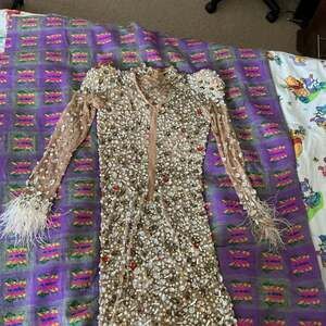 Glamorous Nude Mesh Rhinestone Mini Dress with Feather Cuffs